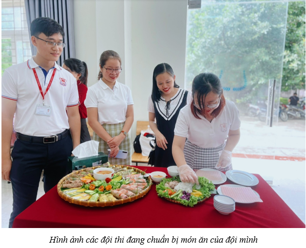 A group of people standing around a table with food

Description automatically generated